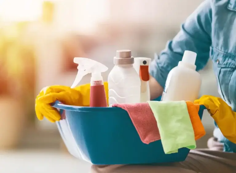 woman holding cleaning bucket